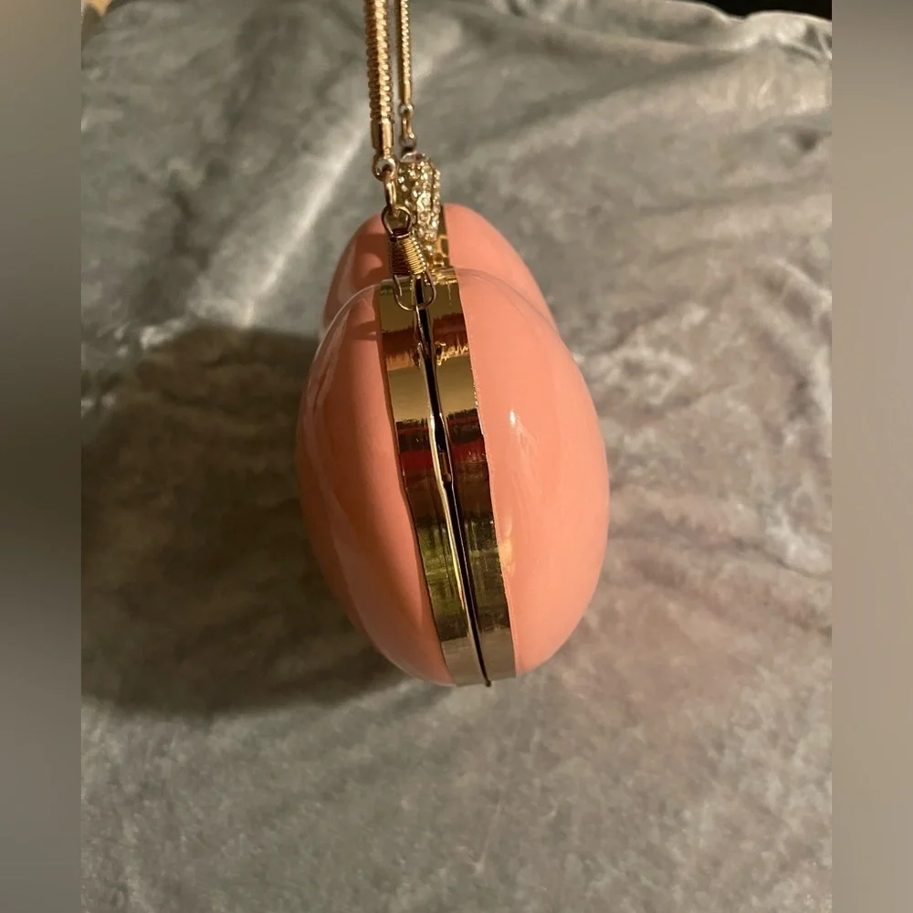 Heart-Shaped Pink Clutch with Gold Handle